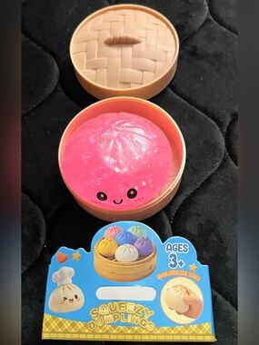 Glittery Pink Squishy Dumpling, FREE mini squishy w/ purchase